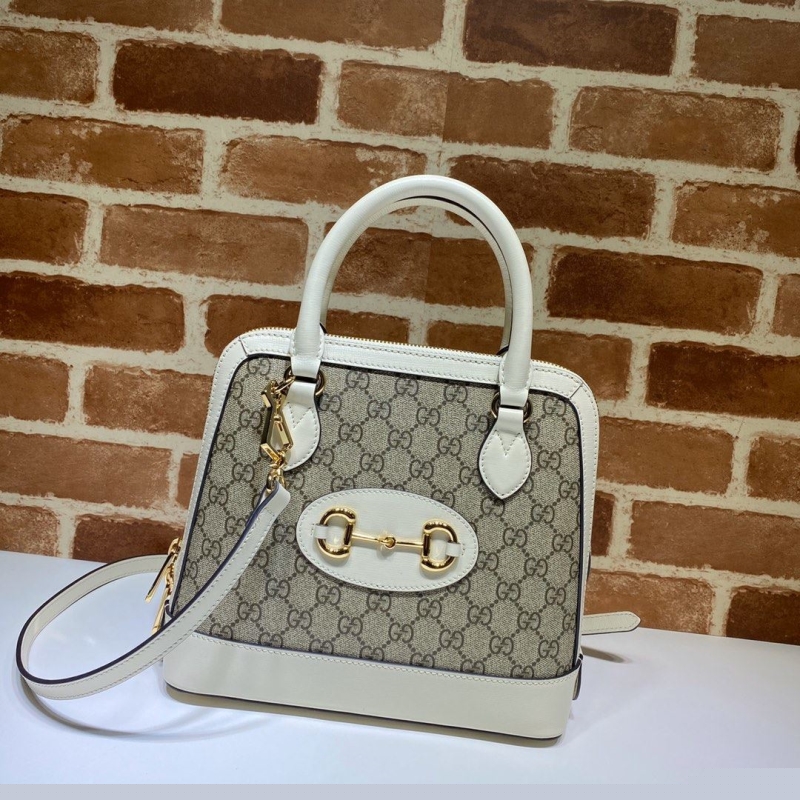 G*u*i top handle bags